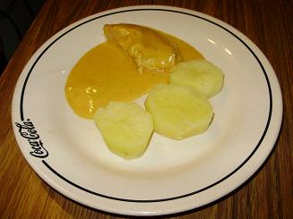 Pollo con salsa dorada